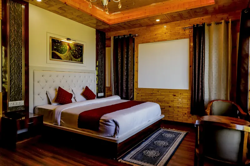 Chandelier room with warm wood panelling