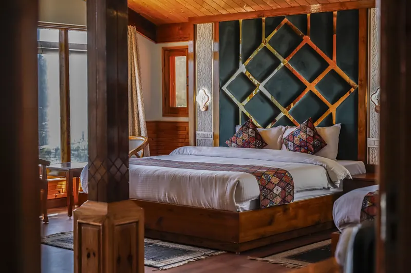Orchard Suite: teal and brass lattice headboard
