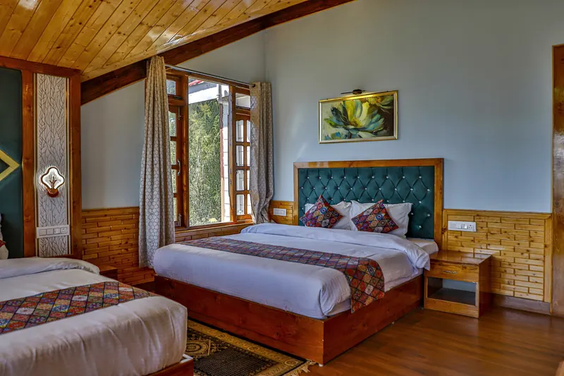 Orchard Suite: second bed by the orchard-side window